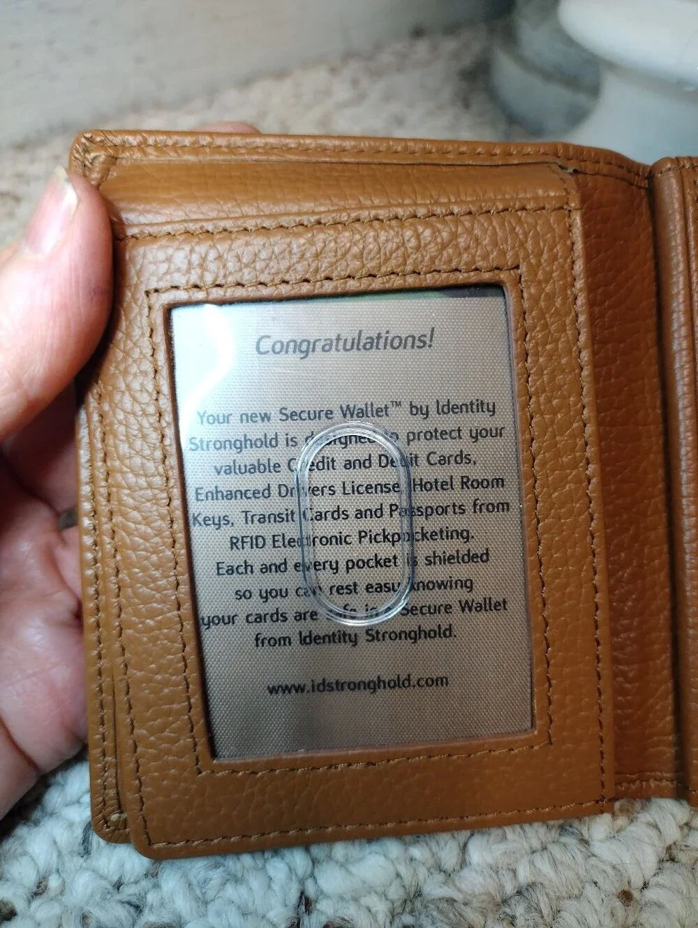 Identity Stronghold RFID Protected Tan Pebbled Leather Buckle Decorated Wallet